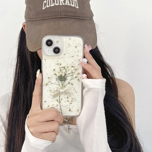 Floral iPhone case with real dried flowers, gold foil, and 3D bowknot detail