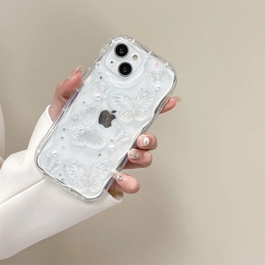 Detail of transparent iPhone case with white 3D pearl butterflies and wavy edge design