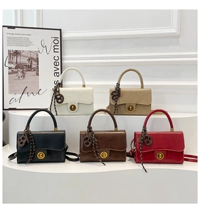 Detailed view of five color options for small PU leather tote bags with gold twist locks