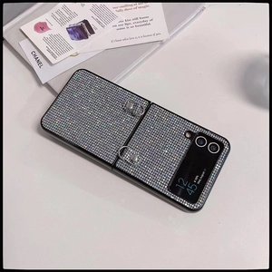 Detail of glitter folding case for Samsung Z Flip5 with silver metal strap hooks