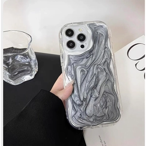 Close-up of wavy silver fluid pattern on protective transparent iPhone case