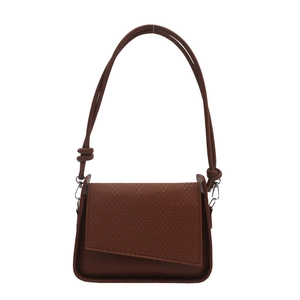 Brown woven flap shoulder bag with textured leather and knot detail rope strap on white back