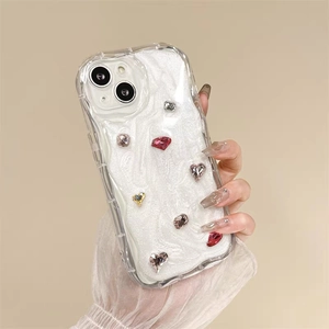 Detailed view of luxury iPhone case with colorful gemstones and marble glitter texture