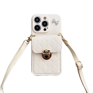 Cream iPhone leather case with diamond bow, crossbody strap and quilted wallet