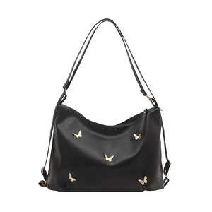 Elegant black PU leather tote bag with gold butterfly accents and long shoulder straps