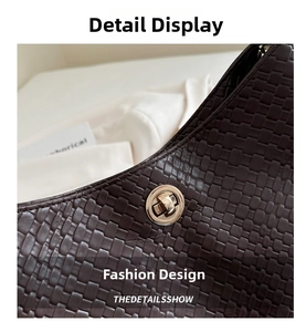 Macro shot of dark brown woven PU leather bag featuring a round golden metal twist lock