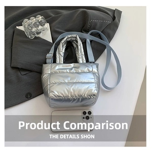 Silver quilted bucket bag with light blue strap and phone for size comparison