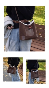 Detail of brown corduroy tote bag with white faux fur trim and red toggle drawstring