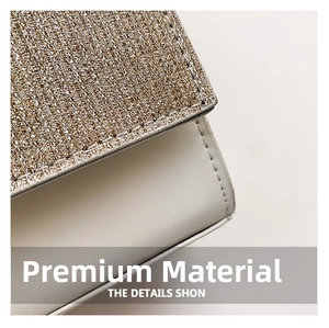 Detailed close-up of golden sequin woven fabric and precise white PU leather stitching