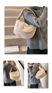 Detail of cream quilted padded shoulder bag featuring a metal buckle and soft texture