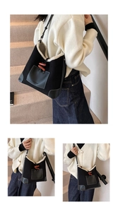 Detail of winter tote bag with faux shearling trim and stylish toggle horn closure