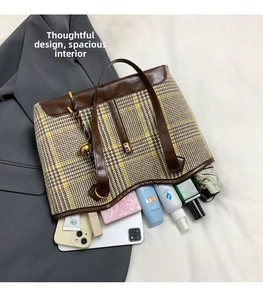 Top view of houndstooth tote bag interior showing spacious storage for daily essentials