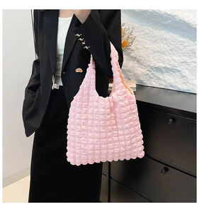Detail of pink puffy bubble texture canvas tote bag with large capacity design