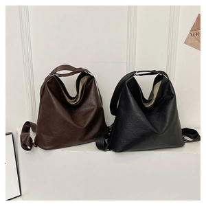 Détails de grands sacs cabas en cuir souple marron et noir avec larges bandoulières