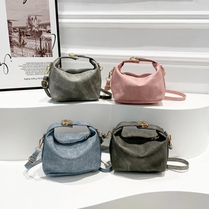 Chic half-moon crossbody bags in four colors with adjustable straps and metal locks