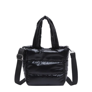 Quilted black puffer tote bag with high-shine fabric and detachable shoulder strap