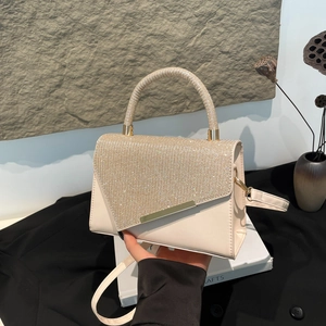 Elegant off-white crossbody bag with sparkling rhinestones and golden metal buckle