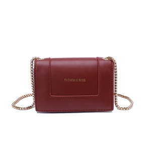 Classic wine red leather crossbody bag with gold chain strap and fashion lettering