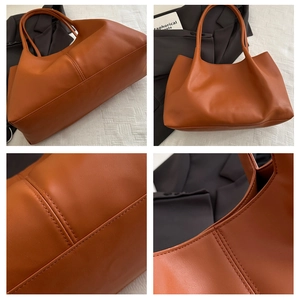 Detail view of brown tote bag with high-quality stitching and large capacity design