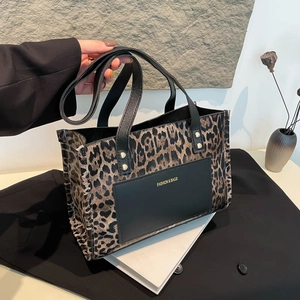 Sac fourre-tout tendance imprimé léopard avec poche noire et rivets dorés chic