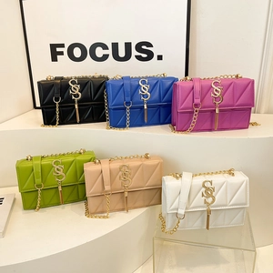 Minimalist quilted chain crossbody bag for women in six vibrant colors with S-pendant