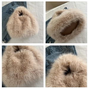Detail view of plush faux fur handbag showing soft texture and sturdy bottom structure