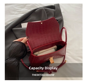 Interior view showing the storage capacity of the wine red crocodile pattern handbag