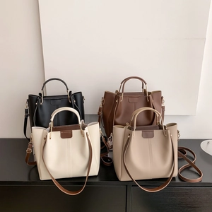 Minimalist large PU leather tote bags with metal handles in black, brown, and beige