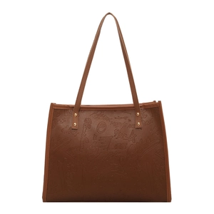 Brown leather tote bag with embossed graffiti letters and long shoulder straps