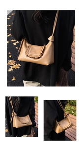 Detail of camel leather ruffle shoulder bag featuring adjustable knot straps and sleek design