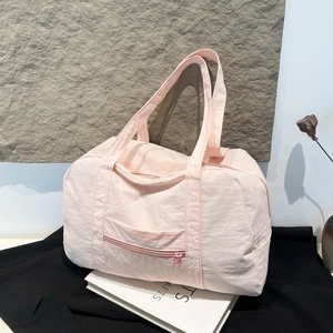 Minimalist light pink nylon travel tote bag with large capacity and multi-pocket design