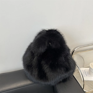 Chic black plush handbag for women featuring a minimalist furry design for winter fashion