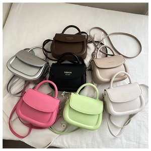 Detailed overhead view of seven stylish saddle bags in various trendy seasonal colors