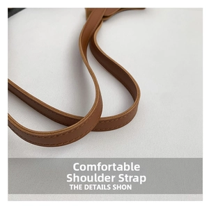 Detail of comfortable caramel brown leather shoulder strap with neat tonal stitching