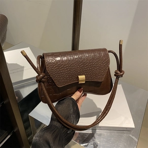 Chic brown crocodile pattern underarm bag with vintage minimalist design and gold buckle