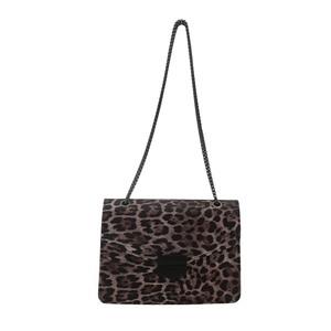 Chic leopard print crossbody bag with metal chain strap and flap closure on white background