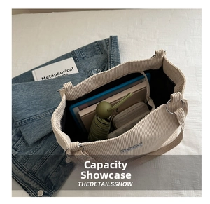 Detailed internal view of large beige corduroy tote bag showing spacious capacity