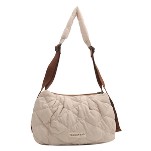 Minimalist beige quilted crossbody tote bag with adjustable shoulder strap and fashion label