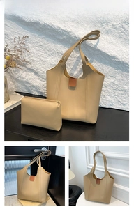 Khaki faux leather tote set featuring a large shoulder bag and matching zipper pouch