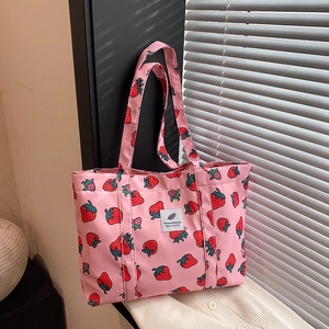 Pink strawberry print tote bag with large capacity and elegant shoulder handles for women