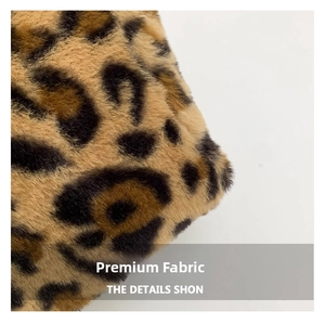 Close-up of soft leopard print faux fur texture on this trendy winter shoulder tote bag