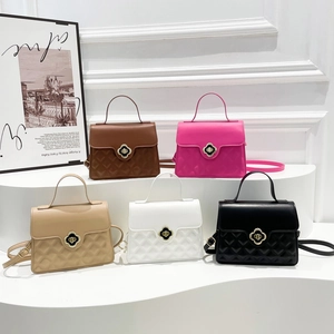 Chic quilted flap shoulder bag with gold clover lock in five stylish colors on display