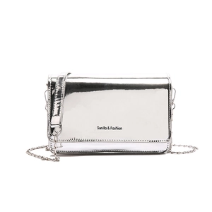 Silver mirror crossbody bag with metal chain strap and minimalist logo on white background
