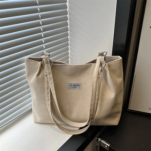 Large capacity corduroy shoulder bag in beige with Fashion Instinct label for daily use