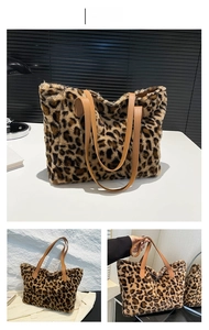 Detail of plush leopard print tote bag featuring faux fur texture and brown leather strap