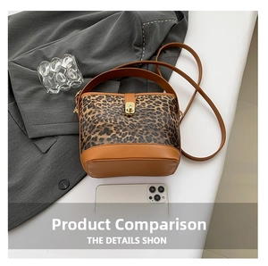 Leopard print bucket bag detail with metal clasp and phone for size comparison