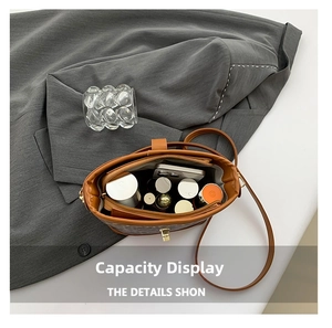 Top view of brown leopard bucket bag showing large interior capacity for cosmetics