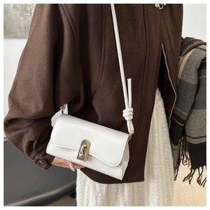 Elegant white PU leather baguette bag with gold buckle and stylish knotted shoulder strap