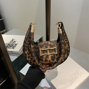 Fashionable leopard print underarm bag with half-moon design and gold hardware