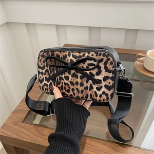 Fashionable leopard print crossbody square bag with black bow and wide strap